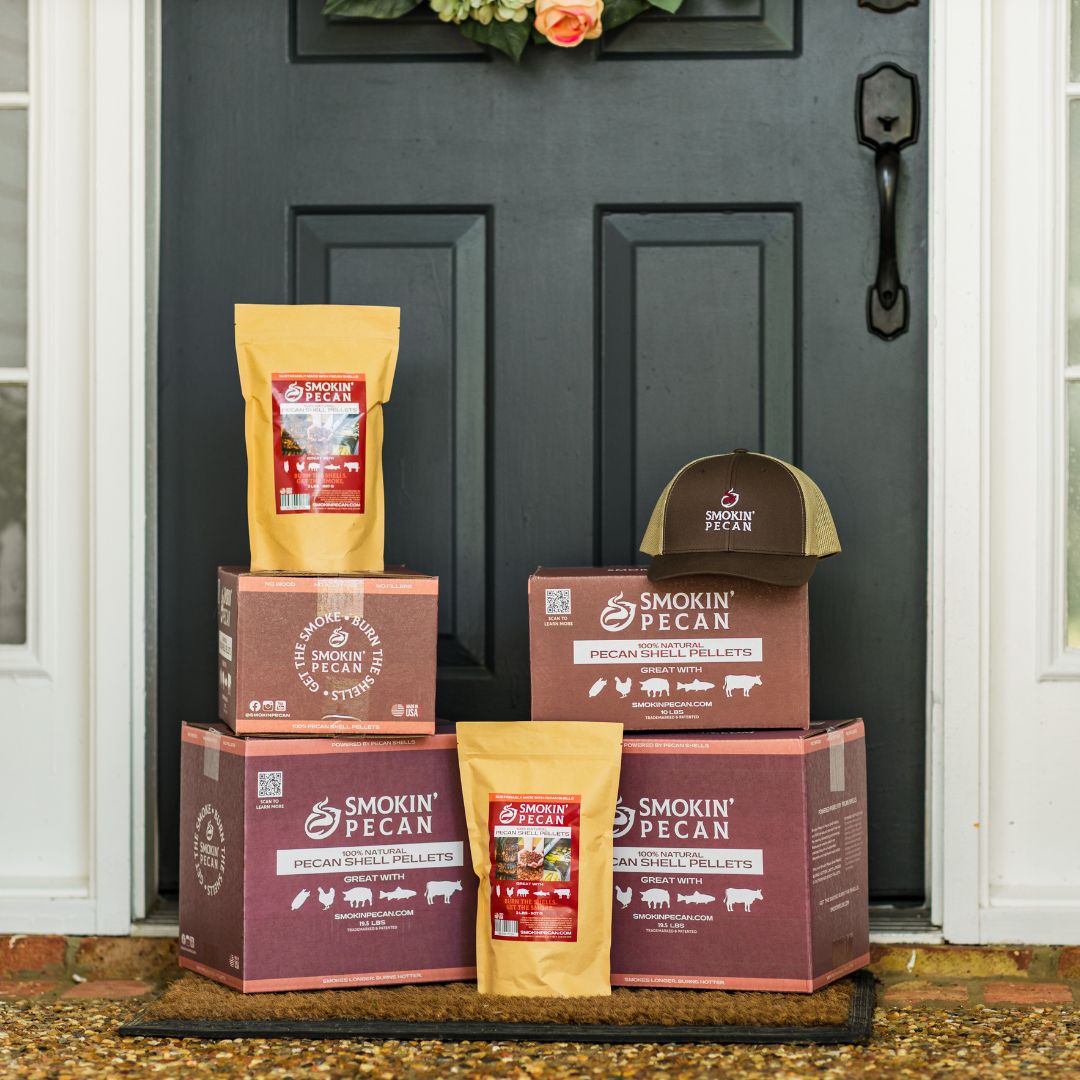 Stack of Smokin' Pecan boxes and bags delivered at the front of the door.